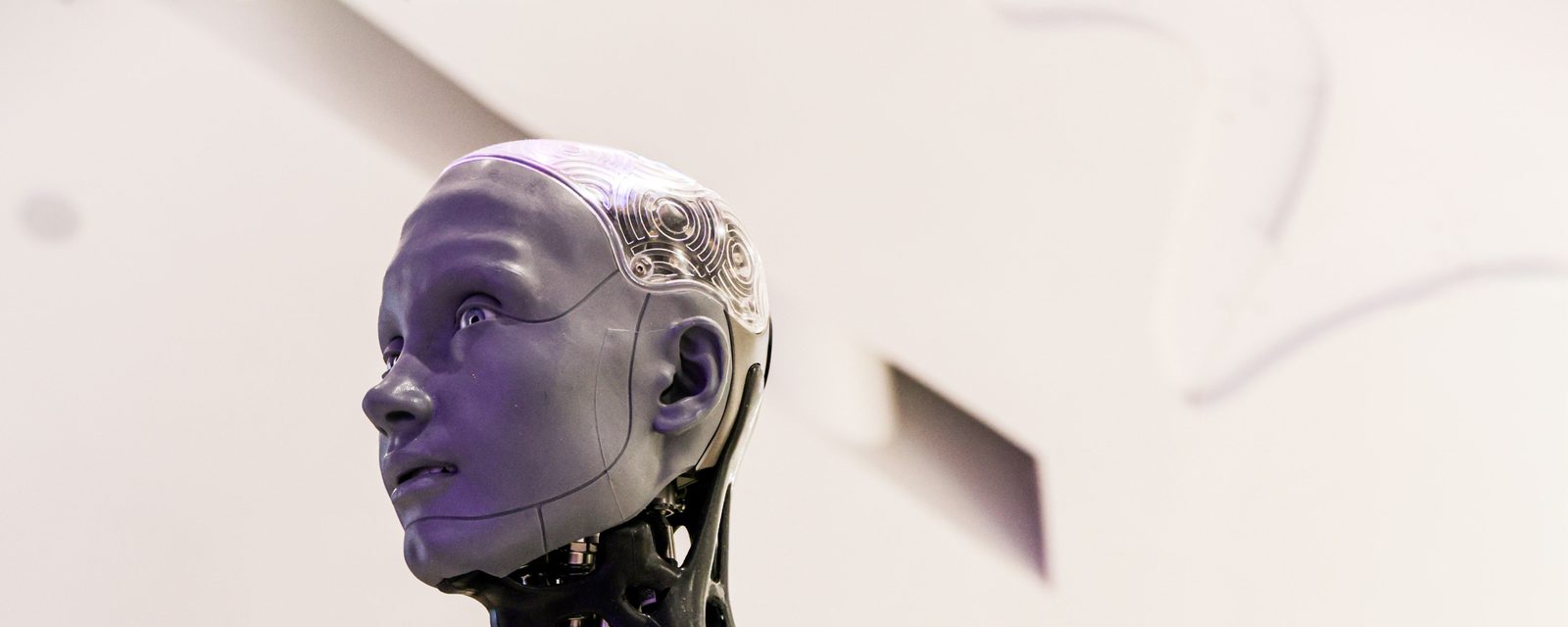 A humanoid robot in profile, representing an AI system interpreting language
